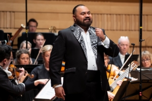 Tenor Manase Latu performing at the IFAC Handa Australian Singing Competition Finals Concert with the Opera Australia Orchestra , under the baton of Dr. Nicholas Milton AM.